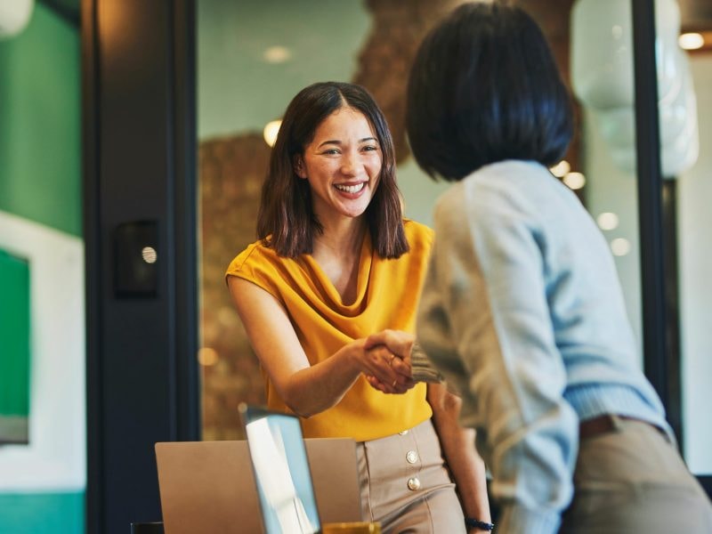 Business partners shaking hands