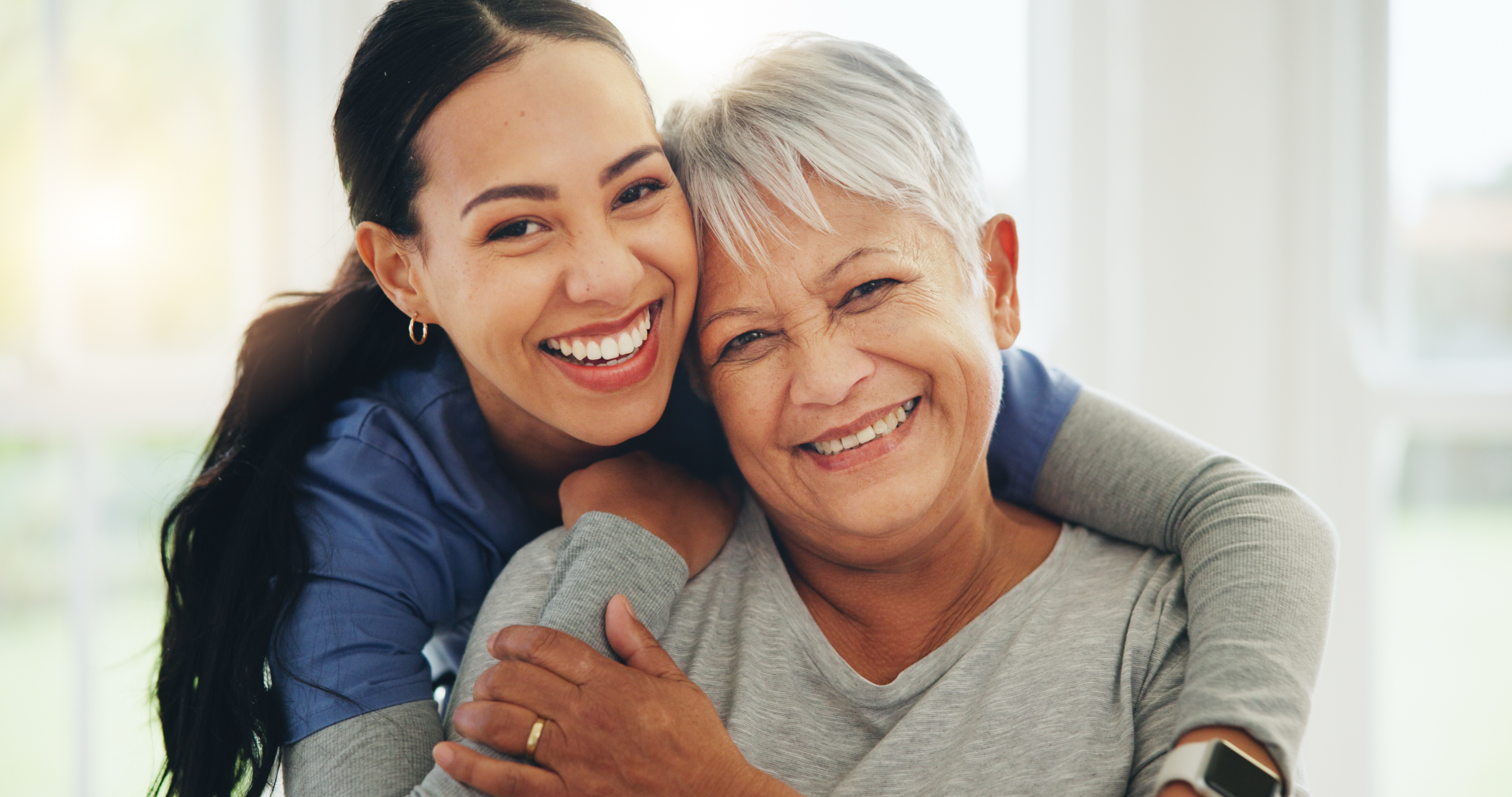 Home care provider providing personalized care to a client in their home by playing piano with the client.